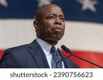 Small photo of Eric Adams speaks during ceremony for final steel beam wrapped with American flag and signed by workers and officials raised at JP Morgan Chase new global headquarters in New York on November 20, 2023
