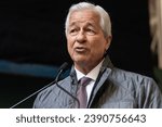 Small photo of Jamie Dimon speaks during ceremony for final steel beam wrapped with American flag and signed by workers and officials raised at JP Morgan Chase new global headquarters in New York on Nov 20, 2023