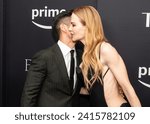 Small photo of Brian Tee and Nicole Kidman wearing dress by Versace attend Amazon Prime MGM Studios 'Expats' premiere at The Museum of Modern Art in New York on January 21, 2024
