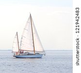 Small photo of Old expensive vintage two-masted sailboat (yawl) close-up, sailing after the storm. Sport, regatta, cruise, tourism, recreation, leisure activity, transportation, nautical vessel, yacht. Seascape