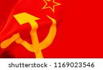 Small photo of Communism and Marxism concept with close up on the hammer and sickle from the flag of the old Union of Soviet Socialist Republics (USSR or Soviet Union) with a wave and copy space