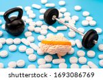 Pharmaceutical supplement for mental fitness, mind health and nootropic drugs concept with human brain with headband, barbell, kettlebell and nootropics