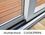 Small photo of Sliding glass door detail and rail embed in floor