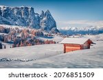 Small photo of Untouched winter landscape. Adorable morning view of Alpe di Siusi village. Wonderful winter sunrise in Dolomite Alps. Superb landscape of ski resort, Italy, Europe. Vacation concept background.