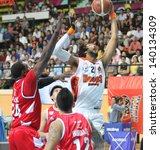 Small photo of BANGKOK - MAY 28:Christien Charles #21 rebound ball compete with Justin Williams #27 in an ASEAN Basketball League "ABL" playoffs game3 at Nimibut Stadium on May 28, 2013 in Bangkok,Thailand.