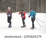 Small photo of Cuchara, CO, USA. March 11, 2023. Athletes participating in a snowshoe race in Southern, Colorado. Snowshoeing is a great exercise to do when it is cold and snowy. It is a very popular sport.