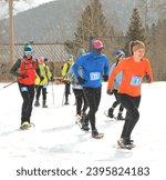 Small photo of Cuchara, CO, USA. March 11, 2023. Athletes participating in a snowshoe race in Southern, Colorado. Snowshoeing is a great exercise to do when it is cold and snowy. It is a very popular sport.