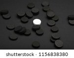 black and white pills on a... | Shutterstock . vector #1156838380