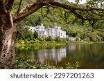 Small photo of Kylemore Abbey with water reflections in Connemara, County Galway, Ireland, Europe. Benedictine monastery founded 1920 on the grounds of Kylemore Castle. Mainistir na Coille Moire