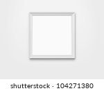 blank photo frame at the wall... | Shutterstock . vector #104271380