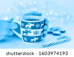 female hand holding cup of tea... | Shutterstock . vector #1603974193