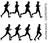 set of silhouettes. runners on... | Shutterstock . vector #1329070973