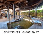 Small photo of Beppu, Japan - Nov 25 2022: Ashiyu Foot Bath is just a few steps down the street from the steam cooking center Jigoku Mushi Kobo in Kanawa district in Beppu, Oita. The bath is free to use.