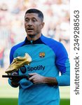 Small photo of BARCELONA - DEC 31: Lewandowski shows the Golden Boot trohpy prior to the LaLiga match between FC Barcelona and RCD Espanyol at the Spotify Camp Nou Stadium on December 31, 2022 in Barcelona, Spain.