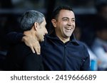 Small photo of Barcelona, Spain. 22th Oct, 2023. Valverde (L) and Xavi (R) salute prior to the LaLiga EA Sports match between FC Barcelona and Athletic Club de Bilbao at the Estadi Olimpic Lluis Companys.