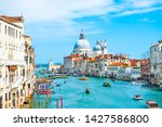 Grand Canal and Basilica Santa Maria della Salute in Venice, Italy. Famous tourist destination. Travel and vacation concept