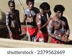 Small photo of LAURA,QLD - JULY 08 2023:Indigenous Australians prepare for ceremonial dance in Laura Quinkan Dance Festival Cape York Australia. Ceremonies combine dance, song, rituals, body decorations and costumes