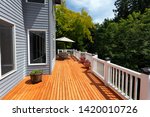 New red cedar outdoor wooden deck during nice weather in horizontal layout  