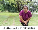 asian fat woman workout... | Shutterstock . vector #2103559376