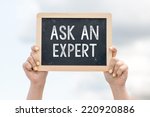 Ask An Expert   Woman Holding...