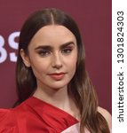 Small photo of LOS ANGELES - FEB 01: Lily Collins arrives for the PBS Masterpiece Photo Call on February 01, 2019 in Pasadena, CA