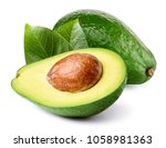 Avocado with leaf isolated on white Clipping Path. Professional food photography
