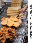 Small photo of roadside cookshop with traditional food in Bangkok, Thailand