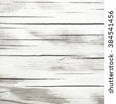 wooden grey polished background | Shutterstock . vector #384541456