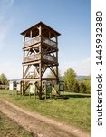Small photo of wooden view tower on Stary Gron hill above Brenna village in Beskid Slaski mountains in Poland during beautiful springtime day