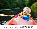 Happy Kid Enjoying Kayak Ride...