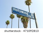 Hollywood Boulevard sign with palm trees