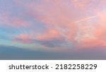 Small photo of Very gentle romantic pink clouds in the dawn sky. tender mood Sunrise Sundown Sunset sky panoramic image