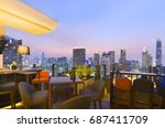 Bangkok city view point from rooftop bar, overlooking a magnificent cityscape blue sky and city light, Thailand