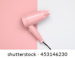 Pink Hair Dryer On Pink And...