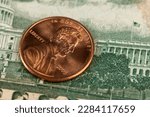 copper American coins with a face value of one cent , a close-up of old coins of 1 cent