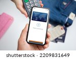 Man and woman payment purchase for phone with face scanning id and payment purchase on pay pass online terminal  in store