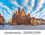 Multicolored houses and City Hall on Market square at sunset, Old Town of Wroclaw, Poland