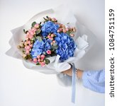 Woman Hand Hold Bouquet Of Blue ...