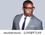 Small photo of Close up candid, swanky, stylish, handsome, businessman, executive, modern glasses isolated on grey