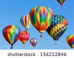 colorful hot air balloons against blue sky
