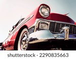 Small photo of Headlight of a classic american car