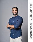 Small photo of Smiling bearded indian business man investor, happy ethnic ceo, corporate executive, professional lawyer, successful rich banker, male office employee or salesman isolated on gray, vertical portrait.
