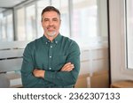 Small photo of Smiling 40 years old middle aged business man in office, portrait. Confident older bank manager or investor, mid adult businessman boss, successful professional Indian entrepreneur looking at camera.