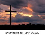 Wooden Cross Over A Sunset