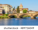 Sculling boat on the river Arno in Florence