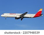 Small photo of Madrid, Spain - March 5, 2015: An Iberia Airbus A321 with the registration EC-ILP approaching Madrid Barajas Airport (MAD). Iberia is the flag carrier airline of Spain with its headquarters in Madrid.