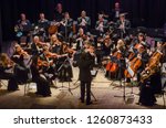 Small photo of DNIPRO, UKRAINE - DECBER 17, 2018: FOUR SEASONS Chamber Orchestra - main conductor Dmitry Logvin perform at the State Drama Theatre.