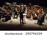 Small photo of DNIPROPETROVSK, UKRAINE - JUNE 22, 2015: FOUR SEASONS Chamber Orchestra - main conductor Dmitry Logvin perform at the State Russian Drama Theatre
