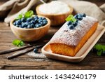 Small photo of Sweet plum cake with yougurt and berry, rustic style and selective focus