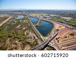 Aerial view of the bike path running beneath the Loop 101 & 202 freeways at the Salt River in Mesa, Arizona looking west to east
